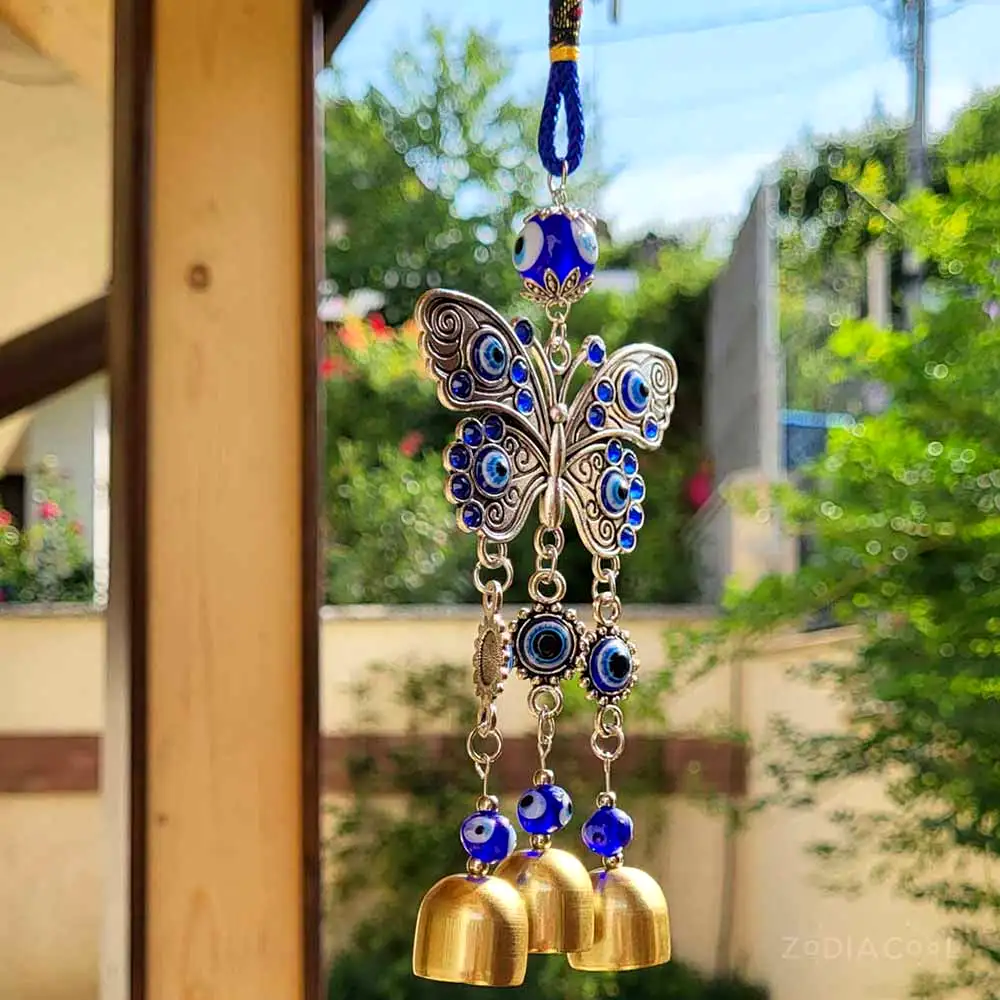 Clopotei metalici de vant cu fluture si ochi magic norocos