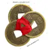 Amuleta trei monede chinezesti legate cu fir rosu, simbol Feng Shui al bogatiei, pentru protectia de pierderi si ghinioane, auriu 