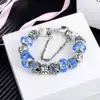 Brățară zodia Gemeni tip Pandora, suflată cu argint cu strasuri montate în charmuri, bleu 19 cm