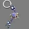 Breloc Nazar cu elefant, amuletă feng shui pentru protecție împotriva energiilor negative și prosperitate, metal solid argintiu 14 cm
