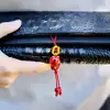 Pisica norocoasa Maneki Neko, amuleta banilor, șirag rosu