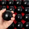 Sfera Onix negru, piatra semipretioasa pentru starile de neliniste, sfere de cristal 5-6 cm suport de lemn