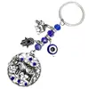 Breloc cu Elefanți, Ochiul Norocos și Mâna Fatimei, amuletă feng shui de protecție împotriva necazurilor și noroc, metal solid argintiu 10 cm