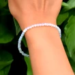 Bratara cuart Opal sau piatra lunii, cca 47 pietricele mici 4 mm alb-albastru
