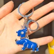 Breloc rinocer si elefant, amuleta protectie accidente, furturi si tradare, metal de calitate, albastru