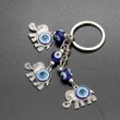 Breloc 3 elefanți cu trompa în sus si ochiul magic norocos albastru, amuletă feng shui de protecție și noroc, metal solid argintiu 11 cm