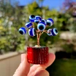 Copacei decorativi cu ochisori magici norocosi, popular numit ochiul lui Horus, amuleta de protectie energii negative, 7 cm albastru