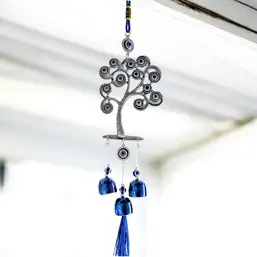 Imagine Clopoței de vânt copacul vieții și ochișori norocoși