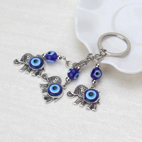 Breloc 3 elefanți cu trompa în sus si ochiul magic norocos albastru, amuletă feng shui de protecție și noroc, metal solid argintiu 11 cm