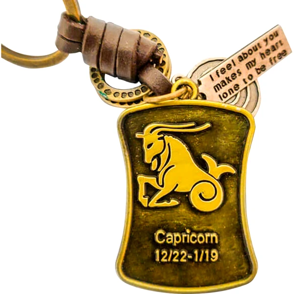 Capricorn, breloc retro cu snur piele si 4 accesorii din cercuri metal, tablita cu mesaj