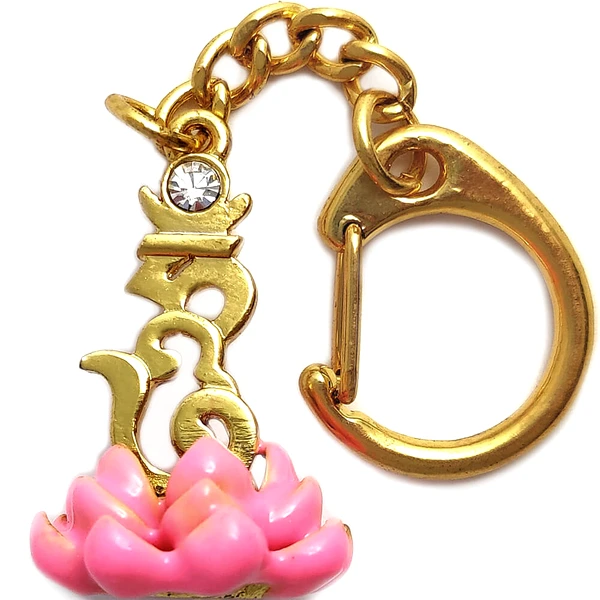 Breloc silaba Hum pe floare de lotus, amuletă feng shui pentru bunăstare și contra energiei negative, metal roz 8 cm