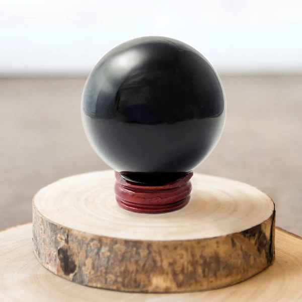 Sfera Onix negru, piatra semipretioasa pentru starile de neliniste, sfere de cristal 5-6 cm suport de lemn
